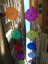 Beautiful coloured umbrellas over the city of Genova