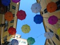 Beautiful coloured umbrellas over the city of Genova