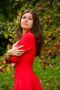 Beautiful colourful famale portrait in the red dress.