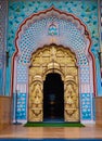 Beautiful colourful gate in jaipur with traditional decoration on it