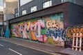 Beautiful colourful graffiti\'s found covering a building wall, Shoreditch, Uk