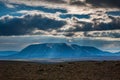 Beautiful colourful Icelandic landscape lava fields mountain geysers zigzag road and moss-covered stones Namafjall,