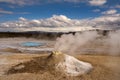 Beautiful colourful Icelandic landscape lava fields mountain geysers zigzag road and moss-covered stones Namafjall,