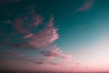 Beautiful and colourful landscape of sunset or sunrise with white clouds, blue green sky with pastel pink color. Natural abstract Royalty Free Stock Photo