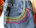 Beautiful colourful pattern on a pair of jeans