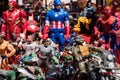 Background of film and cartoon superheroes action figures toys.