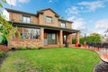 Beautiful column backyard poch with patio area and trim