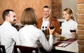 Company of friends eating delicious dinner Royalty Free Stock Photo