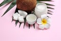 Beautiful composition with coconut oil and nuts Royalty Free Stock Photo