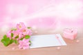 Beautiful composition of delicate pink rose, heart shaped candle Royalty Free Stock Photo