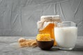 Beautiful composition with milk and honey Royalty Free Stock Photo