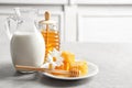 Beautiful composition with milk and honey Royalty Free Stock Photo