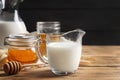 Beautiful composition with milk and honey Royalty Free Stock Photo