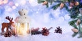 Beautiful composition with vintage Christmas lantern and festive decorations on snow against color background, banner design. Royalty Free Stock Photo