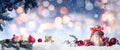 Beautiful composition with vintage Christmas lantern and festive decorations on snow against color background, banner design. Royalty Free Stock Photo