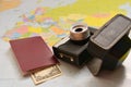 Beautiful concept for summer travel. Map, old camera with sunset and accessories for vacation planning. Royalty Free Stock Photo