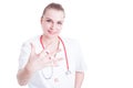 Beautiful and confident female doctor gesturing five