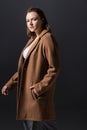 Beautiful, confident overweight girl in coat