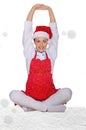 Beautiful cook in Santa Claus hat with snow Royalty Free Stock Photo