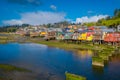 Beautiful coorful houses on stilts palafitos in Castro, Chiloe Island