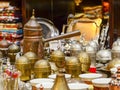 Beautiful copper Turkish Jezve Pot and a set of cups for coffee. Typical Turkish souvenirs. Royalty Free Stock Photo