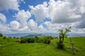 Beautiful countriside landscape in spingtime under a blue sky with clouds, Italy. Royalty Free Stock Photo