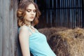 Beautiful country girl in blue dress Royalty Free Stock Photo