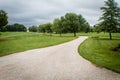 Beautiful country lane leading to farm, on a stormy summer day in Illinois Royalty Free Stock Photo