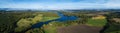 Beautiful countryside landscape with fields, river, forest and huge lake. Aerial panorama of Finland on autumn. Royalty Free Stock Photo