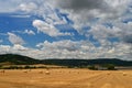 Beautiful countryside landscape. Hay bales in harvested fields Royalty Free Stock Photo