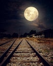 Beautiful countryside Railroad with Milky Way star in night skies, full moon Royalty Free Stock Photo