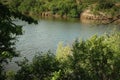 countryside scenery. rich green grass on the shore of the lake Royalty Free Stock Photo