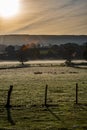 Beautiful countryside view of a glorious sunrise over grassy rural landscape in Devon