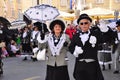 Rijeka, Croatia February 2020.Smiling third age couple in carnival mask standing on the street during Rijeka carnival, the b Royalty Free Stock Photo