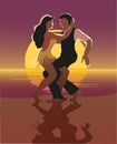 Beautiful couple dancing on the beach Latin salsa dance.