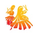 Beautiful Couple dancing with dandiya on celebration of navratri festival of india