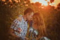 Beautiful couple having fun in sunflowers fields Royalty Free Stock Photo