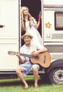 Beautiful couple having a great time outdoors. Laughing, singing Royalty Free Stock Photo