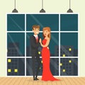 Beautiful Couple Having Romantic Date, Pretty Woman in Elegant Red Dress and Man in Black Suit Dancing Against Royalty Free Stock Photo