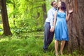 Beautiful couple having romantic moment in forest