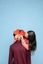 Beautiful couple in love on blue studio background. Valentine& x27;s Day, love and emotions concept Royalty Free Stock Photo