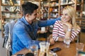 Beautiful couple in love flirting in cafe Royalty Free Stock Photo