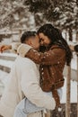 Beautiful Couple In Love kissing and laughing. Amazing winter holiday. Saint Valentine`s Day.