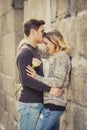 Beautiful couple in love kissing on street alley celebrating Valentines day Royalty Free Stock Photo