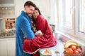 Beautiful couple in love in kitchen Royalty Free Stock Photo