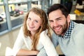 Beautiful couple in love sitting in cafe taking selfies Royalty Free Stock Photo