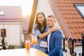 Beautiful couple in love is sitting at a table in an outdoor cafe on a date Royalty Free Stock Photo