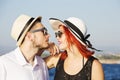 Beautiful couple of lovers sailing on a boat. Royalty Free Stock Photo