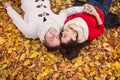 Beautiful couple lying on the ground Royalty Free Stock Photo