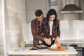 Beautiful couple spend time in a kitchen